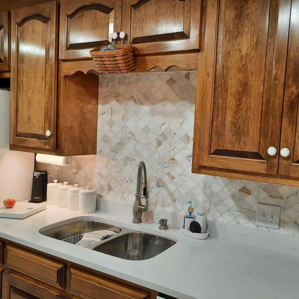 Kitchen Sink and Wooden Cabinets with Calacatta Marble Arabesque Tile Backsplash