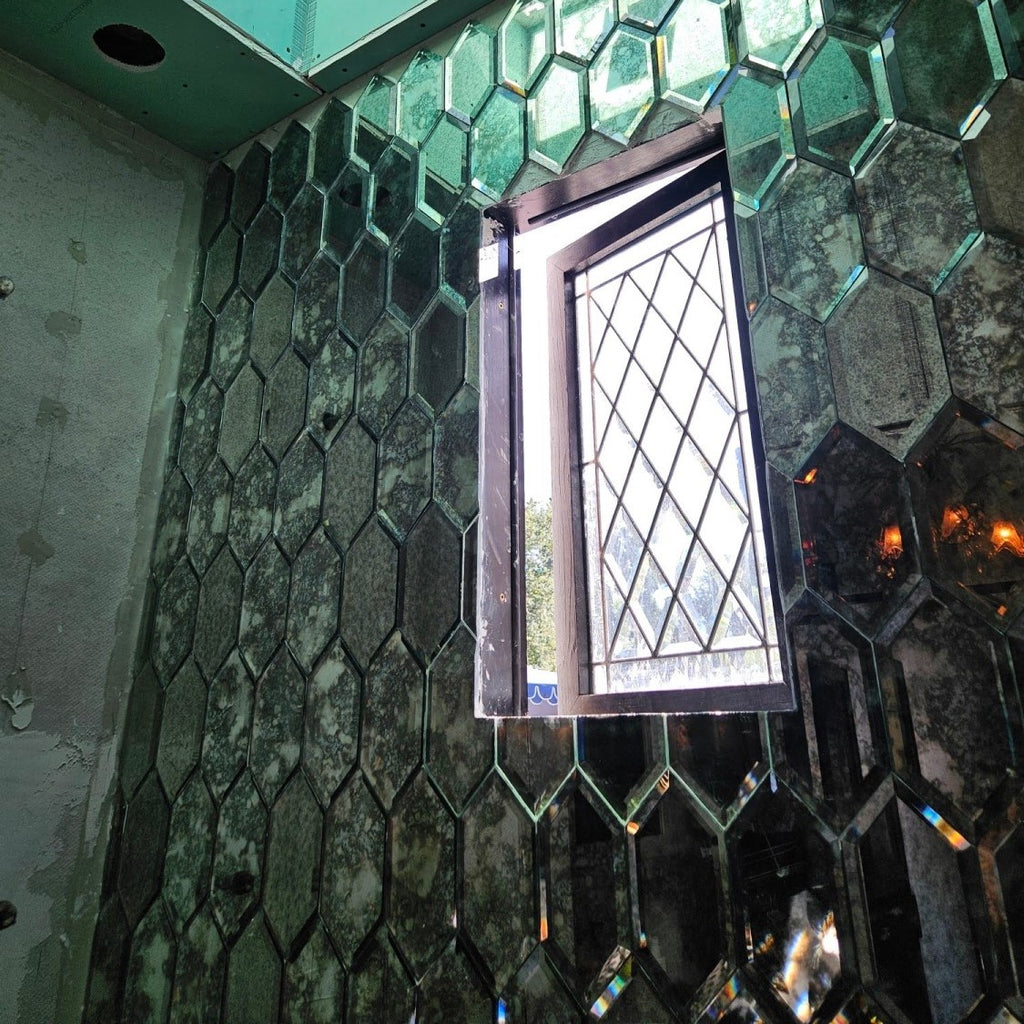 50/50 mix of regular and distressed antique mirror glass beveled stretched hexagon tiles