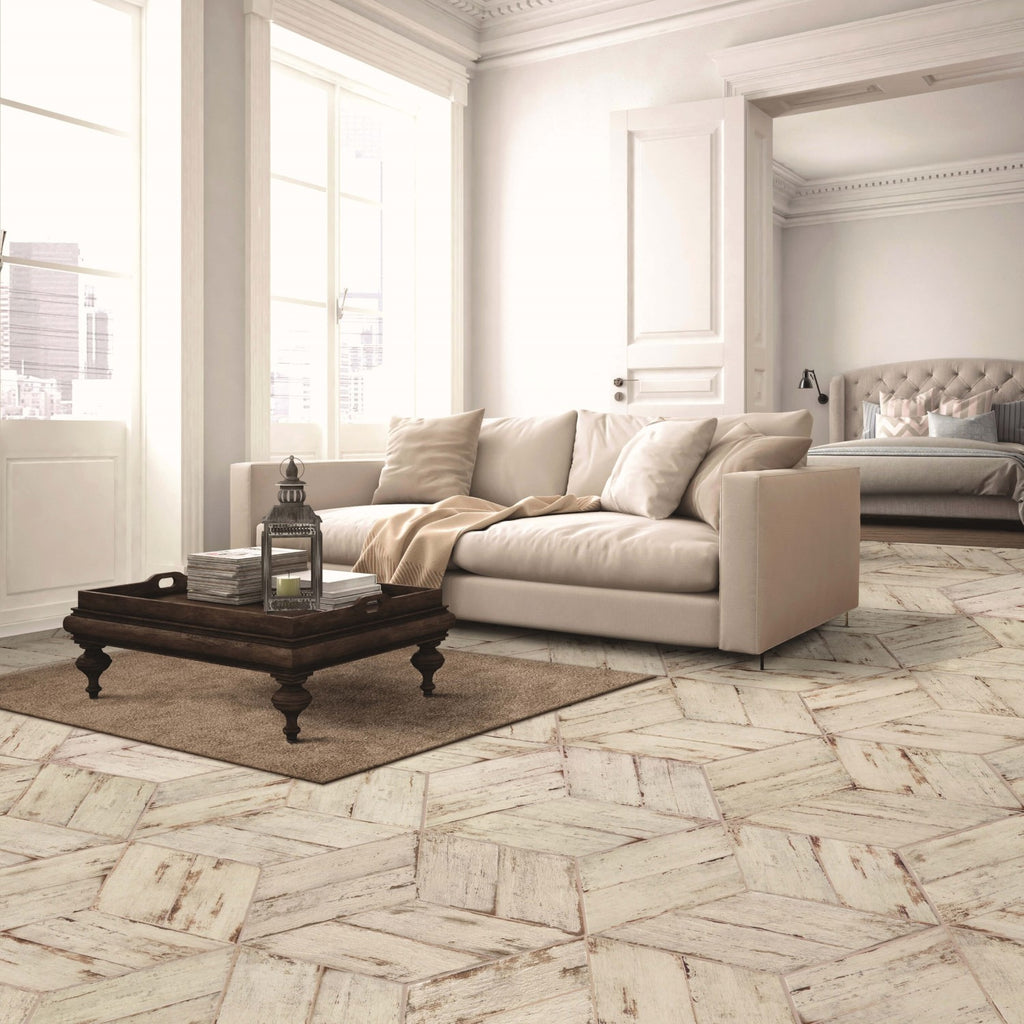 Living Room with White Walls, Couch, Vintage Style Table and Rustic Distressed Wood Look Porcelain Tile Floor